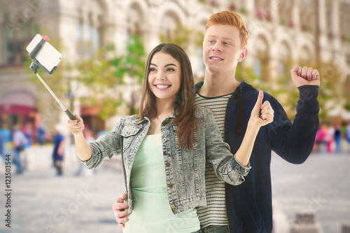 Young happy couple taking s...
