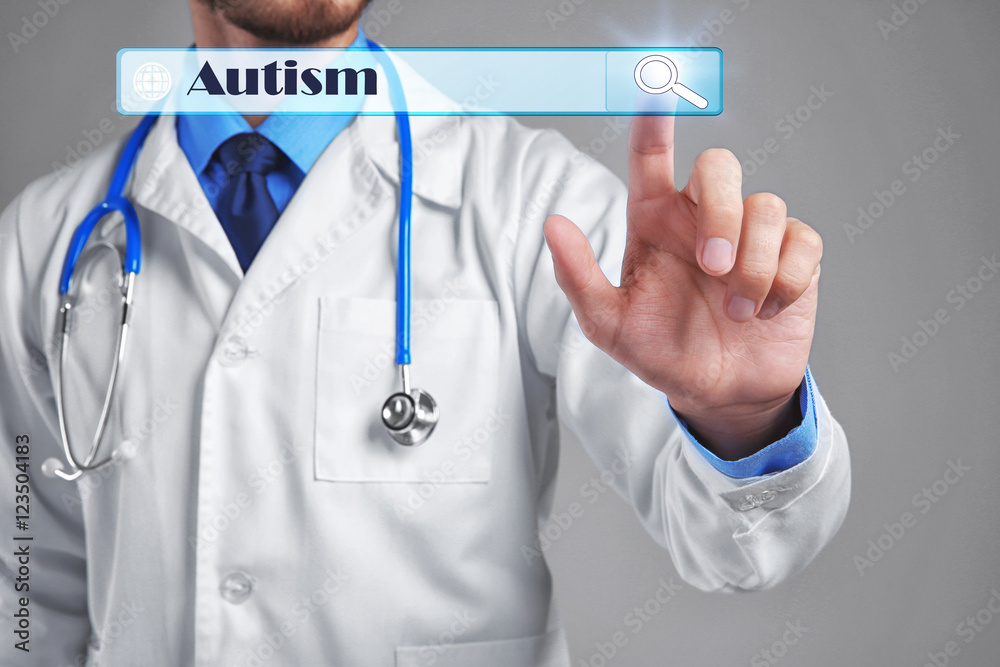 Doctor working with virtual screen. Children autism concept Doctor working with virtual screen. Children autism concept