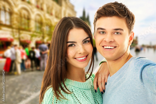 Young happy couple taking s...