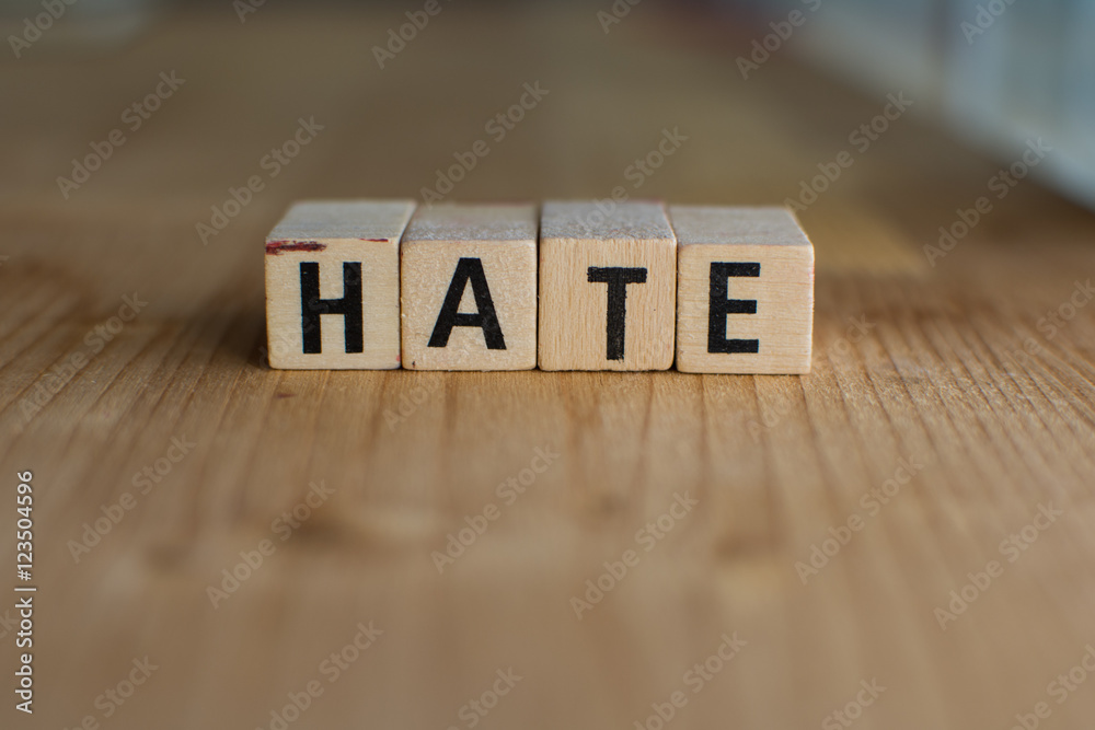 Word hate made with block wood letters Word hate made with block wood letters