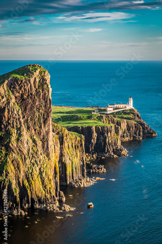 Breathtaking dusk at the Neist point lighthouse in Isle of Skye, Scotland