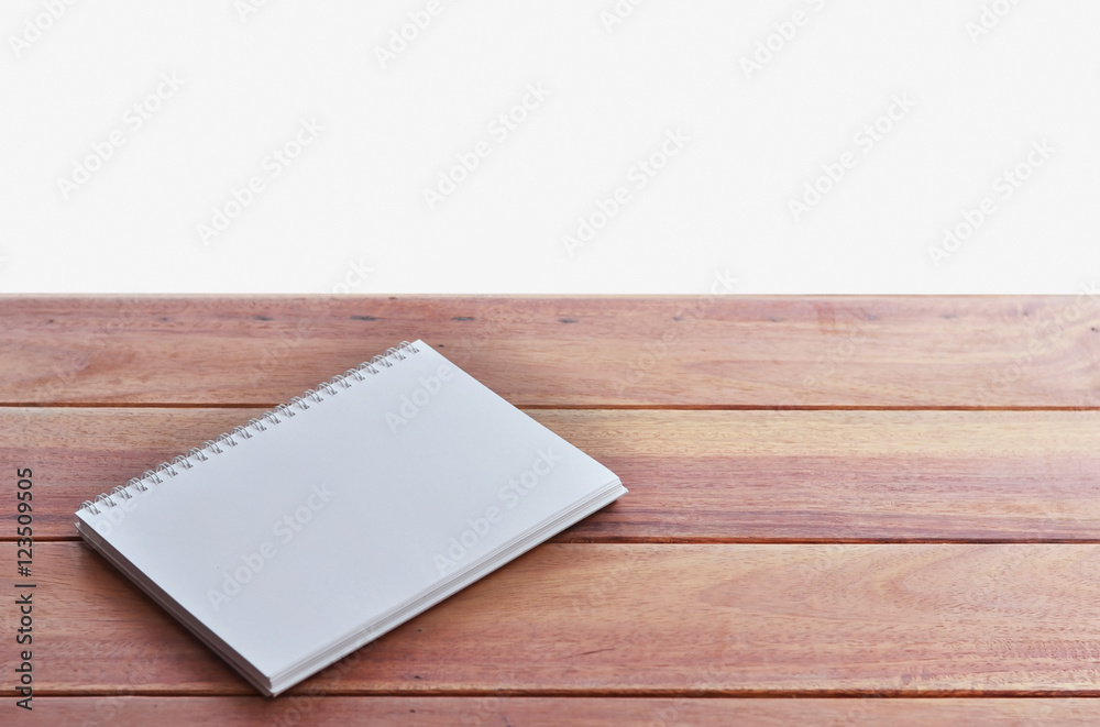 empty white paper page of binder notebook on table and white background empty white paper page of binder notebook on table and white background