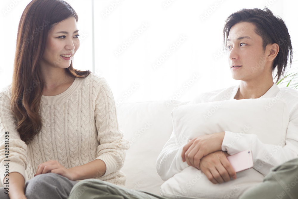 The couple has been conversation each other staring The couple has been conversation each other staring