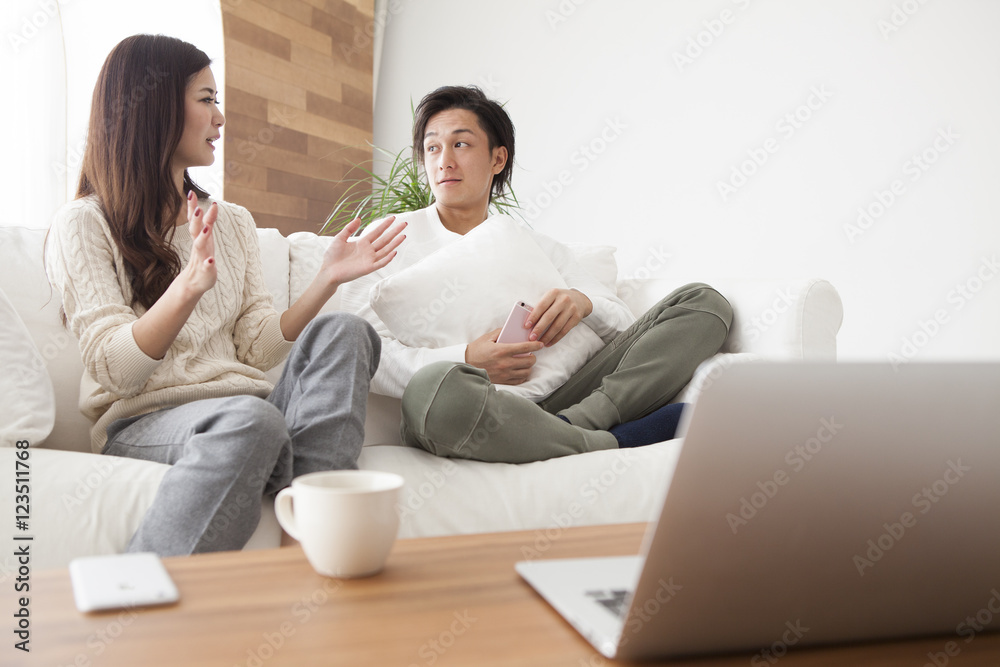 The couple are relaxing in the living room