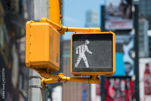 Pedestrian traffic walk light on New York City street photo