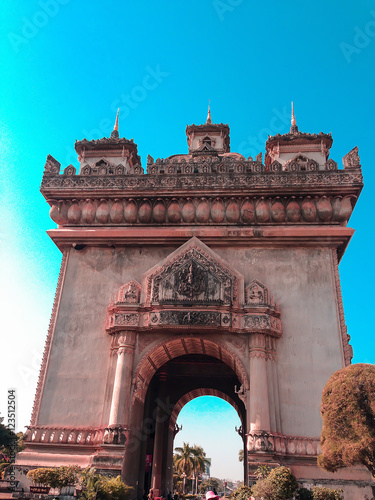 Patuxai literally meaning Victory Gate or Gate of Triumph, formerly the Anousavary or Anosavari Monument, known by the French as (Monument Aux Morts) is a war monument in the centre of Vientiane,Laos photo