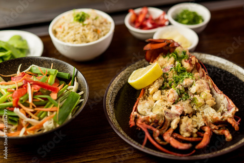 Lobster dish with mixed salad served in restaurant