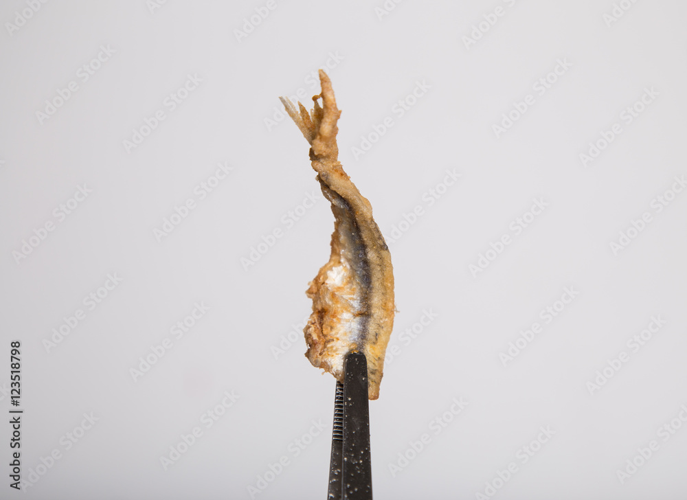 Fototapeta premium fried fish on a fork