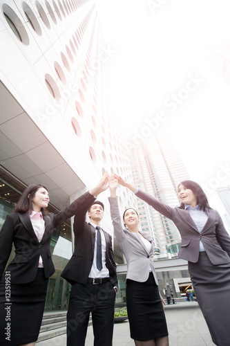 Photography businesspeople give five