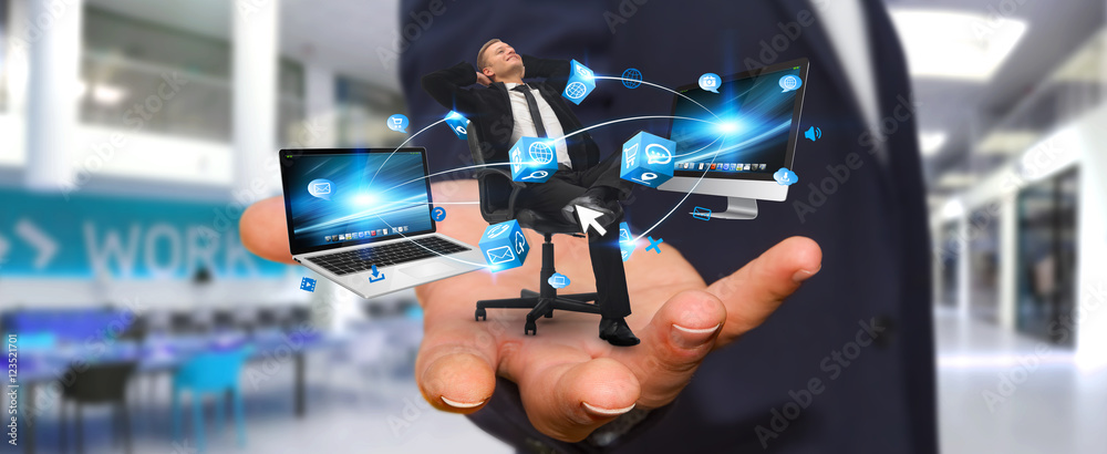 Man on his chair at the office connected to modern devices Man on his chair at the office connected to modern devices