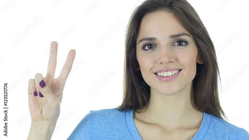 Beautiful Brunette Woman Showing Victory Sign, White Background Beautiful Brunette Woman Showing Victory Sign, White Background
