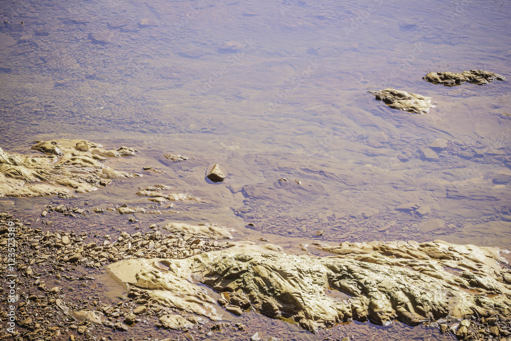 Stones and water surface in the river at Suratthani, Thailand. Stones and water surface in the river at Suratthani, Thailand.