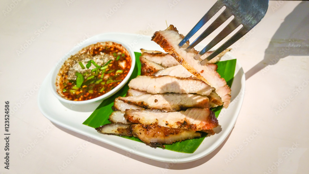Grilled sliced Pork BBQ Savory and spicy sauce . Adjust the image darker tone Grilled sliced Pork BBQ Savory and spicy sauce . Adjust the image darker tone