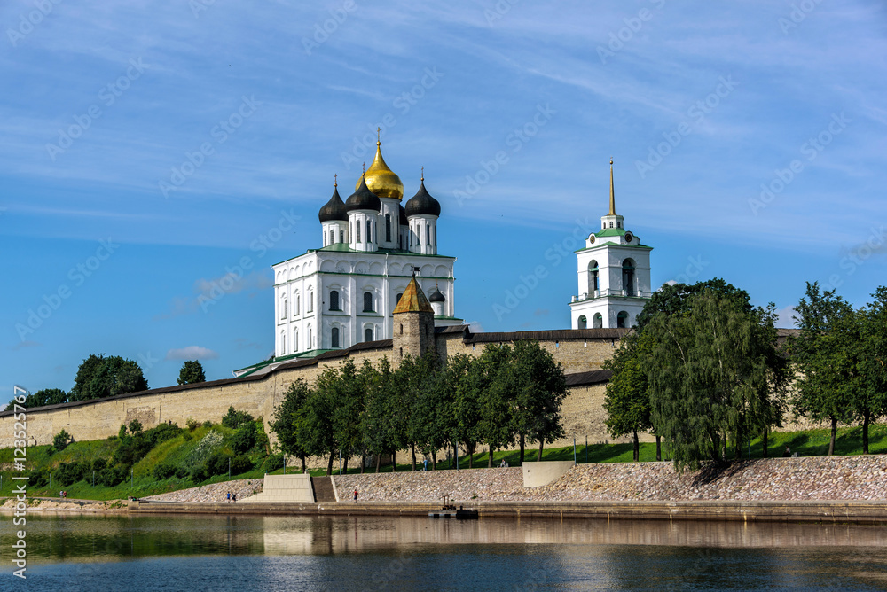 View of the Pskov Kremlin from Velikaya River in the summer in a sunny weather