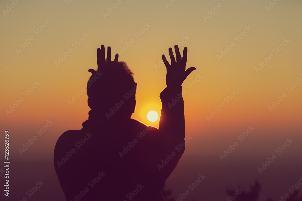Man enjoying in sunset.
