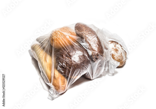 Different kinds of bread in transparent plastic bag