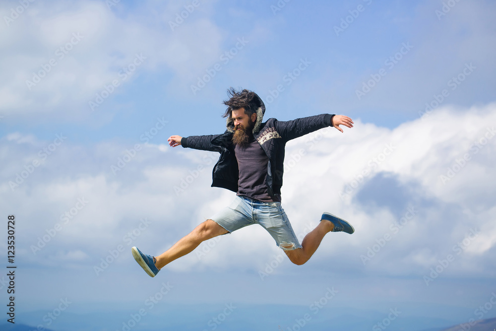 Man hipster jumps