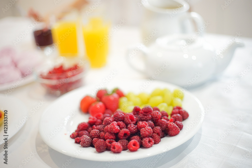 Bowl with berries on the table Bowl with berries on the table