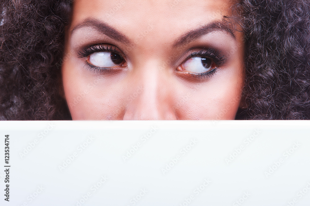 Portrait of a beautiful young black girl with laptop running Portrait of a beautiful young black girl with laptop running