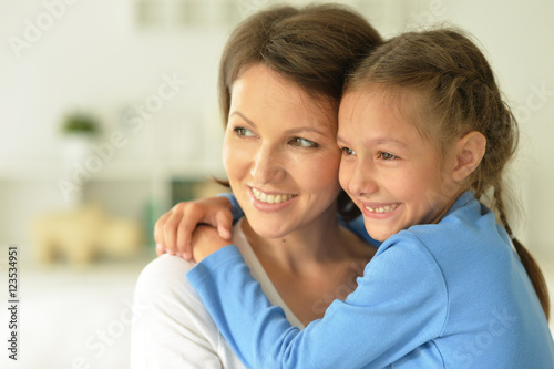 Mother with daughter at home