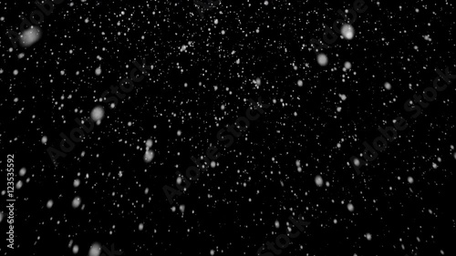 Isolated snow falling on black background