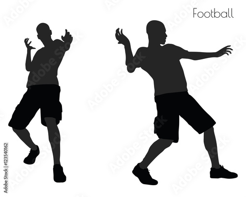 man in Football pose on white background