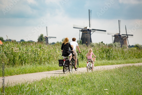 Family on bikes in nature