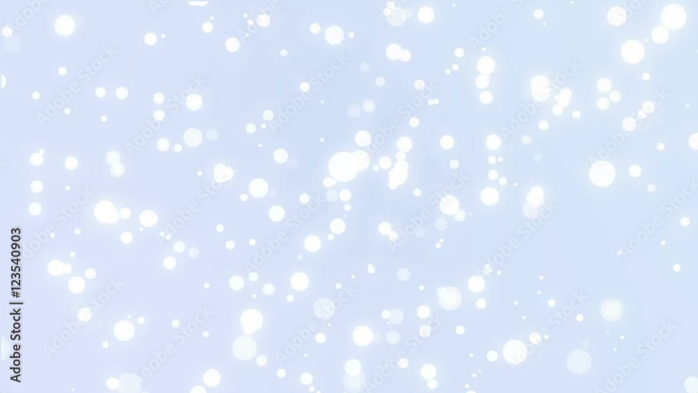 Sparkly white dot particles moving across a light blue gradient background imitating winter snowflakes. Sparkly white dot particles moving across a light blue gradient background imitating winter snowflakes.