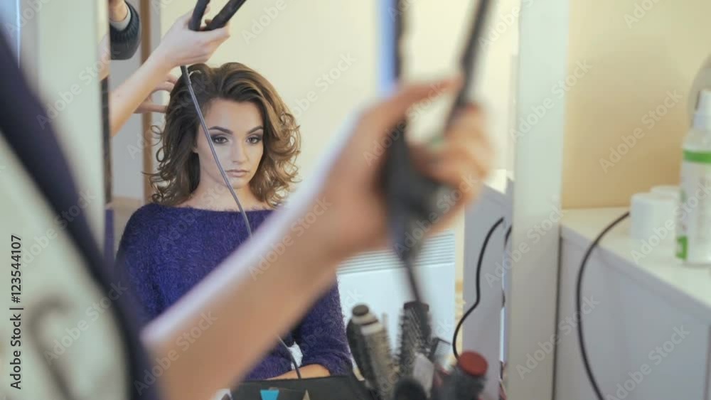 Curles. Beautiful brown hair make styling Curles. Beautiful brown hair make styling