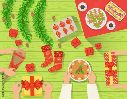 Family At The traditionally Served Christmas Table View From Above