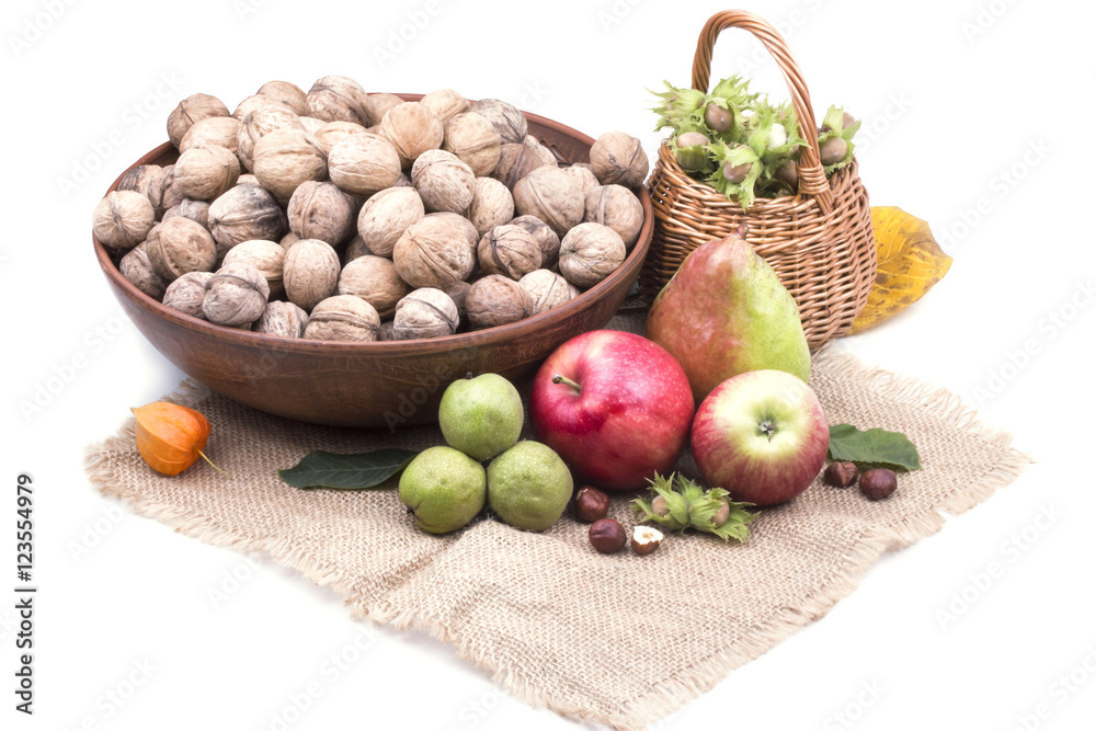 delicious ripe apples with pears near Walnut and hazelnuts on sa delicious ripe apples with pears near Walnut and hazelnuts on sa