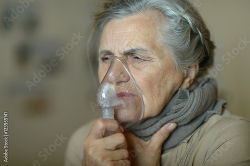 woman with flu inhalation