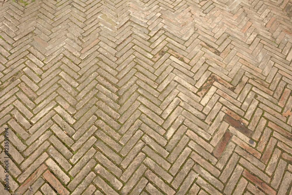 Detail of a sidewalk surface from the Burano island in Venice, i Detail of a sidewalk surface from the Burano island in Venice, i