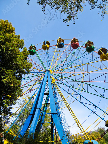 Ferris wheel in green park of city Kremenchug