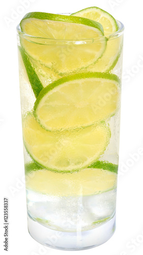 Fresh cold lemonade from lime with ice close up