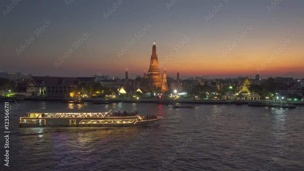 Wat Arun buddhist temple and boats on Chao Phraya river at twilight time in Bangkok, Thailand 4k
Wat Arun buddhist temple and boats on Chao Phraya river at twilight time in Bangkok, Thailand 4k