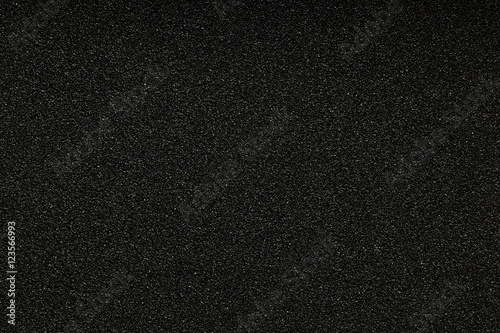 Black monotone grain texture. Glitter sand background.