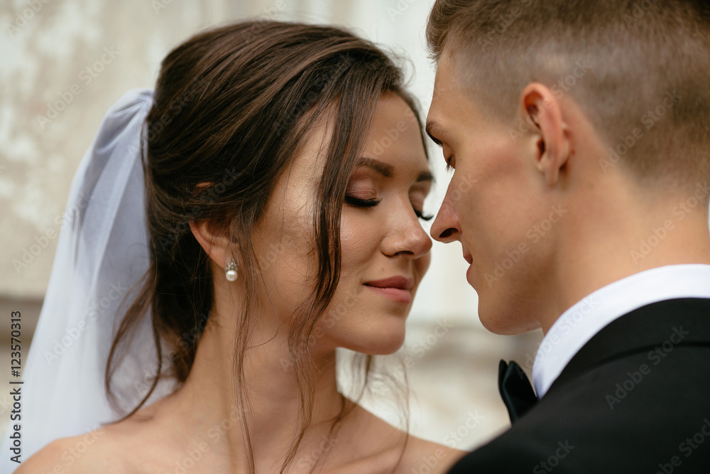 Wedding day. Close-up portrait of a beautiful bride and groom after the wedding ceremony. Wedding day. Close-up portrait of a beautiful bride and groom after the wedding ceremony.