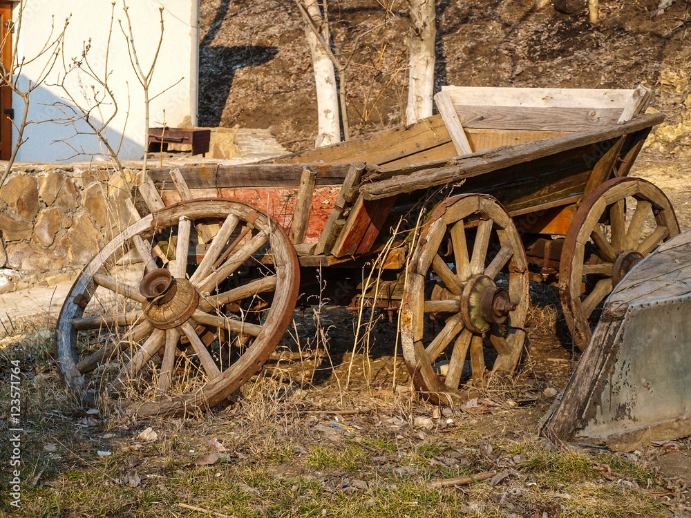 Old wagon and boat beautifully destroyed on the outskirts of the infield Old wagon and boat beautifully destroyed on the outskirts of the infield
