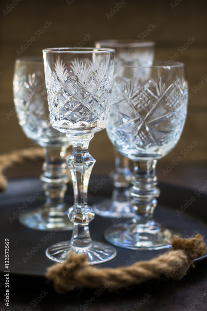 Old crystal glasses and christmas time decoration Old crystal glasses and christmas time decoration