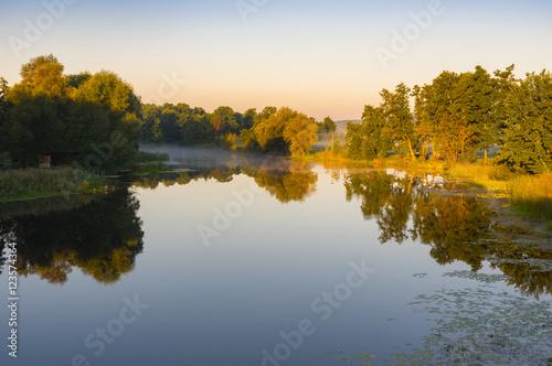 Tranquil landscape on a Vorskla river at summer morning in Ukraine