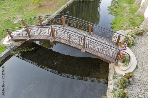 Small bridge over Verke river in Berehove, Ukraine photo