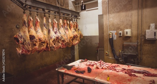 Peeled red meat hanging in the storage room