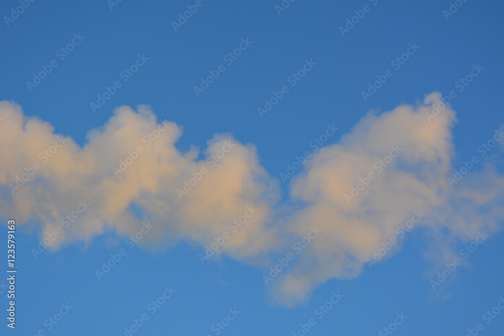 white vapor (smoke) on the background of blue sky, nature, landscape