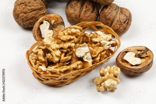 Whole walnuts and kernels on the table