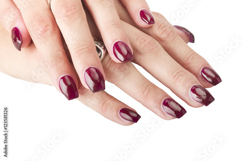 Close up of Female hands with red manicure