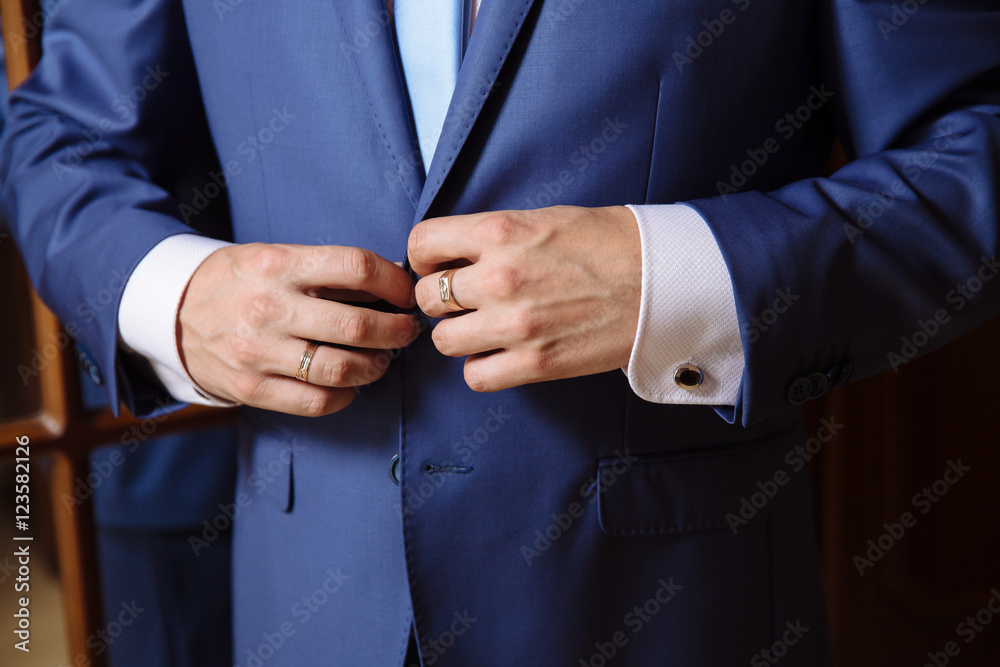 Businessman hands with cufflinks. Elegant gentleman clother Businessman hands with cufflinks. Elegant gentleman clother