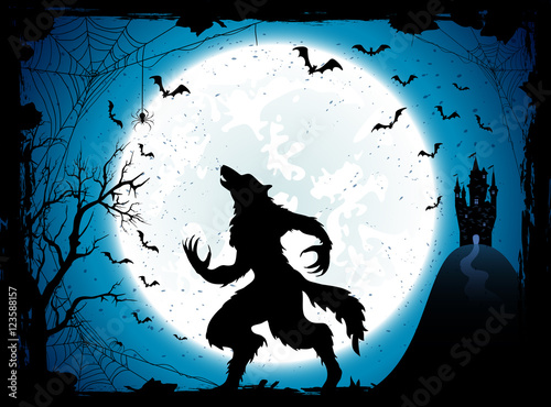 Blue Halloween background with castle and werewolf photo