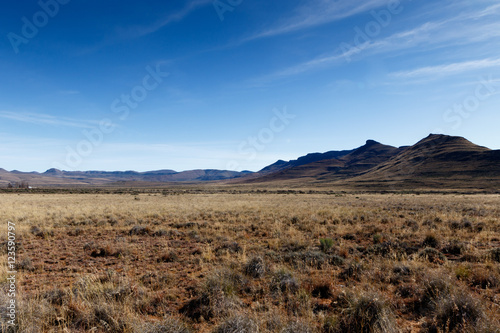 Mountains with blue sky and yellow fields - Graaff-Reinet