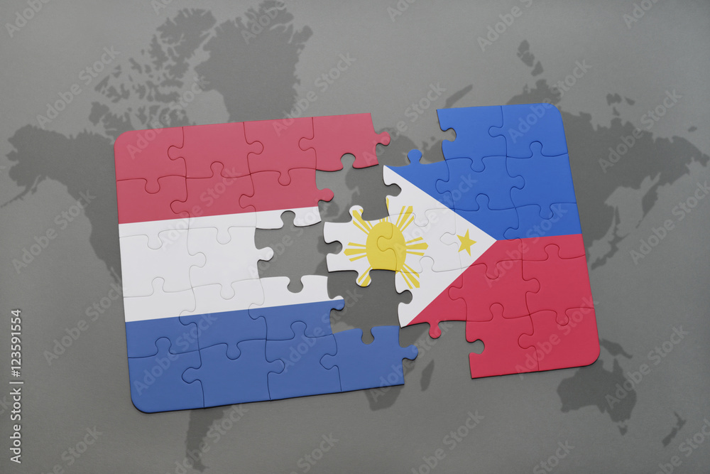 puzzle with the national flag of netherlands and philippines on a world ...